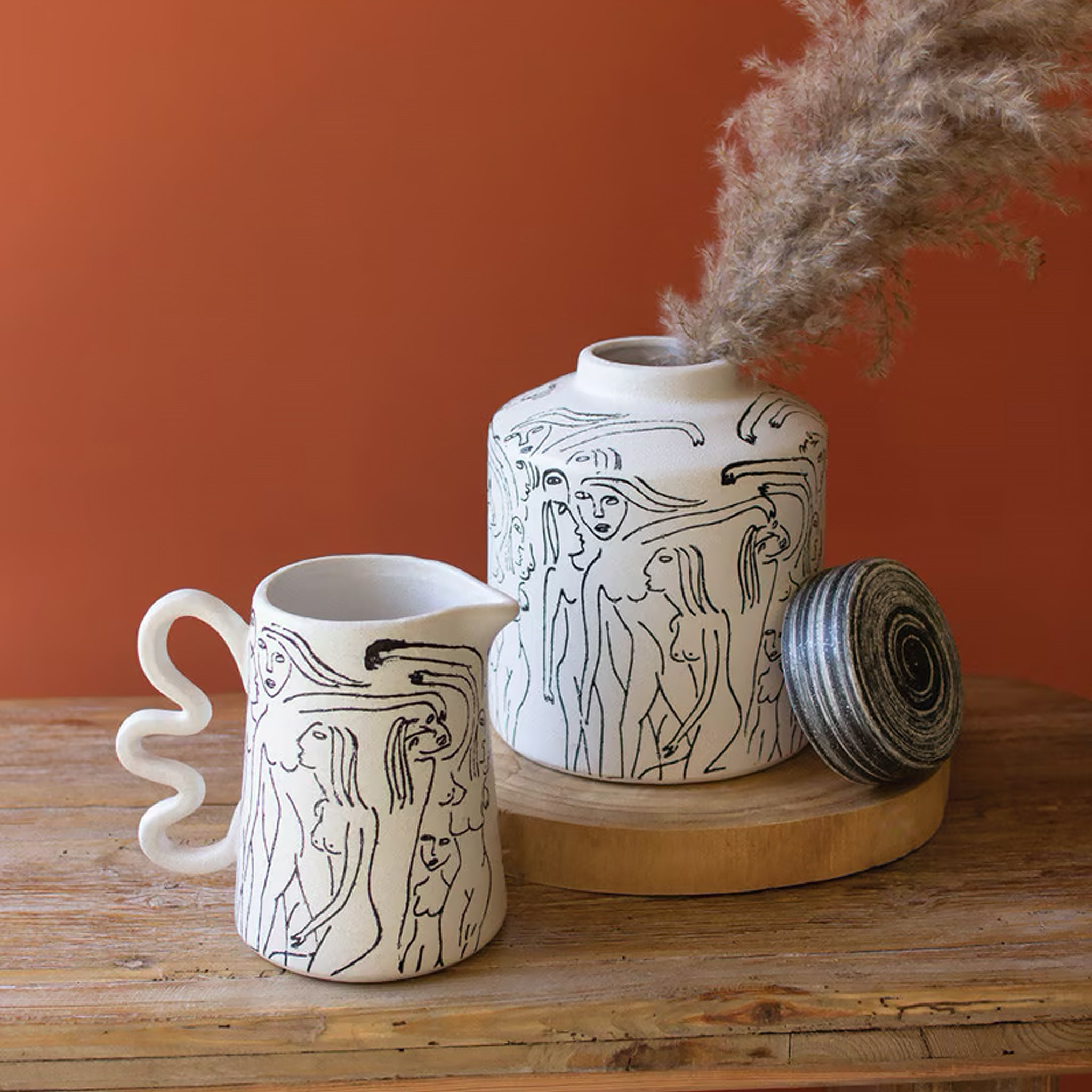 Abstract Figure Canister